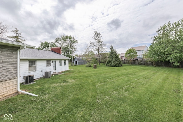 8903 Maple Hill Dr, Indianapolis, IN 46239 - view of yard with central air condition unit