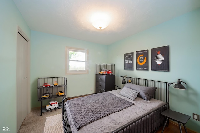 bedroom featuring baseboards