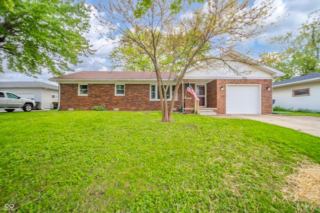 single story home featuring a front yard, a garage, brick siding, and driveway