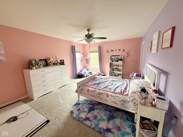 bedroom with carpet and a ceiling fan