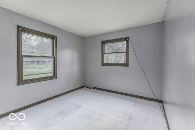 3134 W Hickory Woods Dr, Greenfield, IN 46140 - spare room with healthy amount of natural light and baseboards