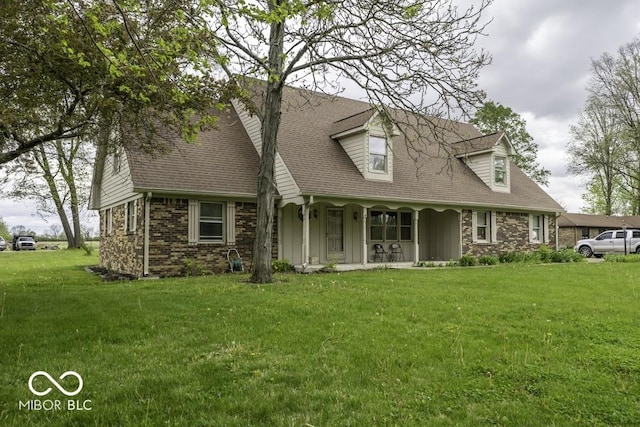 3134 W Hickory Woods Dr, Greenfield, IN 46140 - cape cod-style house featuring a porch, a front yard, roof with shingles, and brick siding