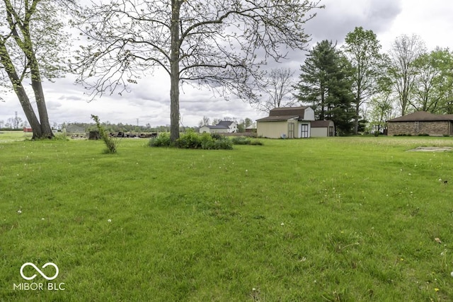 3134 W Hickory Woods Dr, Greenfield, IN 46140 - view of green lawn with an outdoor structure