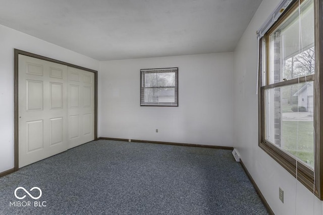 3134 W Hickory Woods Dr, Greenfield, IN 46140 - unfurnished bedroom with carpet floors, baseboards, and a closet