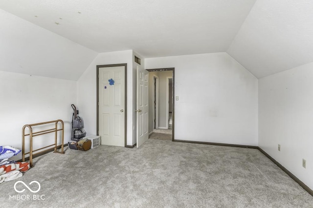 3134 W Hickory Woods Dr, Greenfield, IN 46140 - additional living space with lofted ceiling, carpet floors, and baseboards