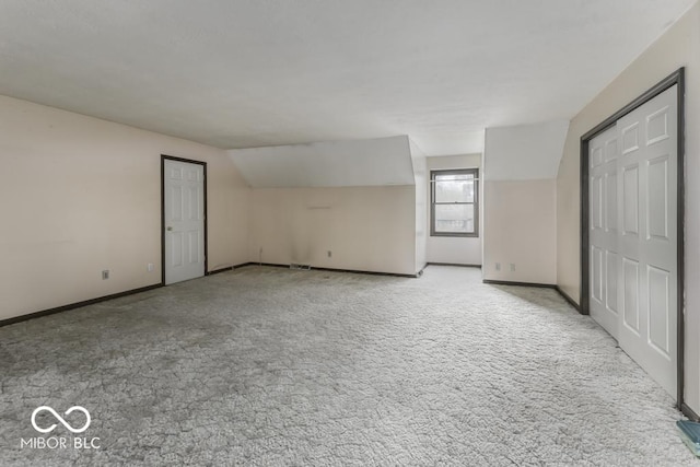 3134 W Hickory Woods Dr, Greenfield, IN 46140 - unfurnished bedroom with light colored carpet, baseboards, and lofted ceiling
