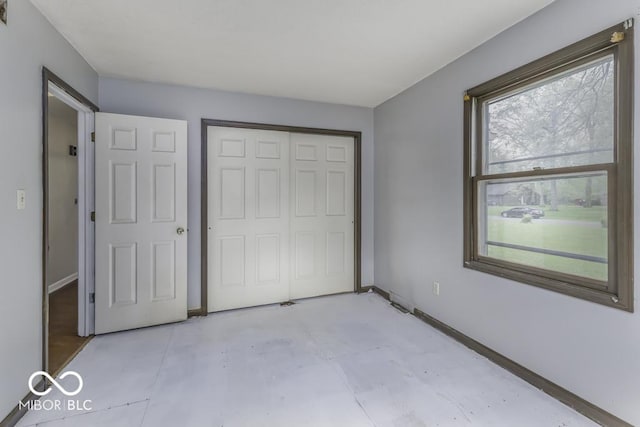 3134 W Hickory Woods Dr, Greenfield, IN 46140 - unfurnished bedroom with a closet and baseboards