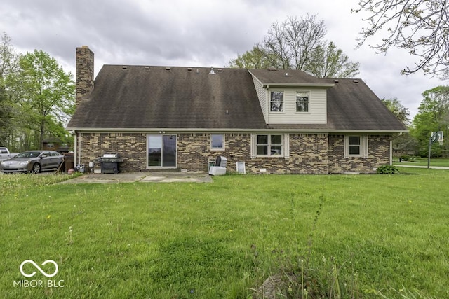 3134 W Hickory Woods Dr, Greenfield, IN 46140 - back of house with a patio area, a yard, and a chimney