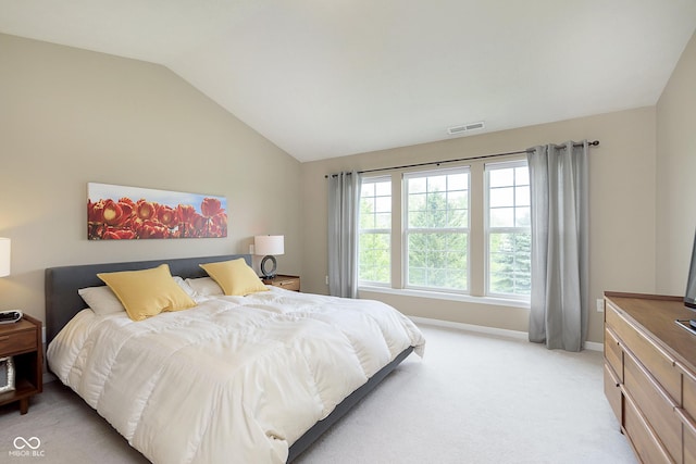 6839 Powder Dr, Indianapolis, IN 46259 - bedroom featuring lofted ceiling, light carpet, and baseboards