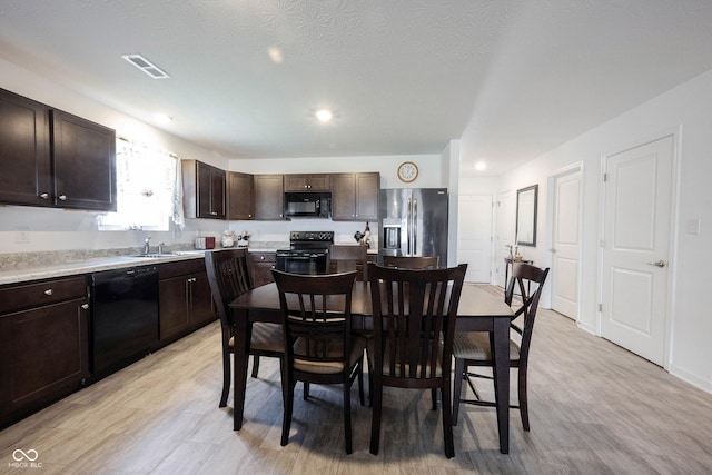 509 Tulip Tree Dr, Lapel, IN 46051 - dining room with light wood finished floors and recessed lighting