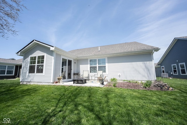 509 Tulip Tree Dr, Lapel, IN 46051 - back of house featuring a patio area, a lawn, and central air condition unit