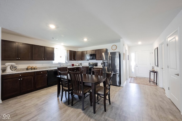 509 Tulip Tree Dr, Lapel, IN 46051 - dining space featuring light wood-style flooring and recessed lighting