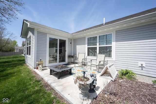 509 Tulip Tree Dr, Lapel, IN 46051 - rear view of property featuring an outdoor fire pit and a patio