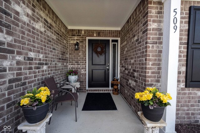509 Tulip Tree Dr, Lapel, IN 46051 - entrance to property with brick siding and a porch