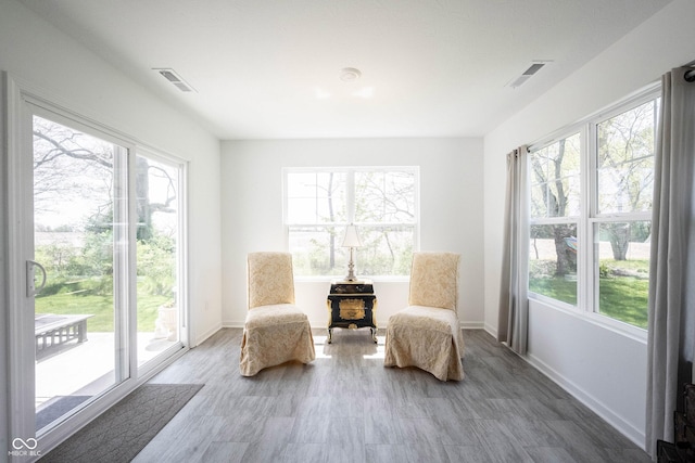 509 Tulip Tree Dr, Lapel, IN 46051 - sitting room with healthy amount of natural light, baseboards, and wood finished floors