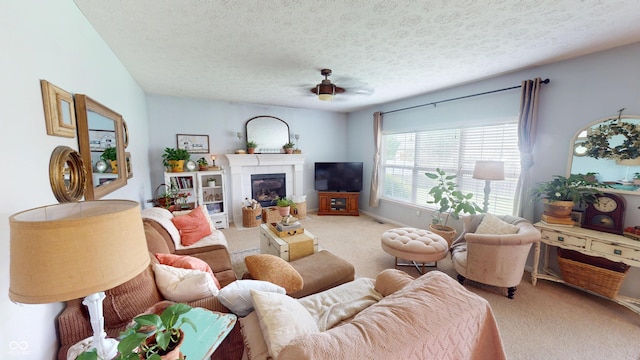 18247 Kinder Oak Dr, Noblesville, IN 46062 - living room with carpet flooring, a tile fireplace, a textured ceiling, and ceiling fan