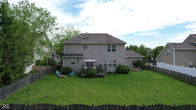 18247 Kinder Oak Dr, Noblesville, IN 46062 - back of house with a fire pit and a deck