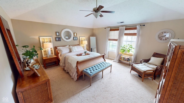 18247 Kinder Oak Dr, Noblesville, IN 46062 - bedroom featuring lofted ceiling, light carpet, ceiling fan, and a textured ceiling