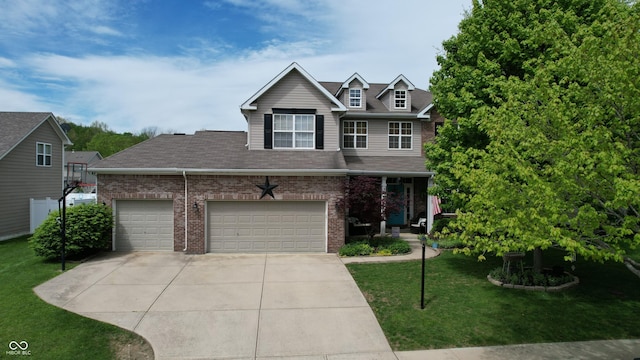 18247 Kinder Oak Dr, Noblesville, IN 46062 - view of front of home featuring driveway, a front yard, brick siding, and an attached garage