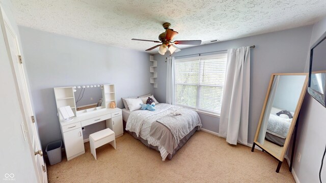 18247 Kinder Oak Dr, Noblesville, IN 46062 - bedroom with light carpet, a textured ceiling, and ceiling fan