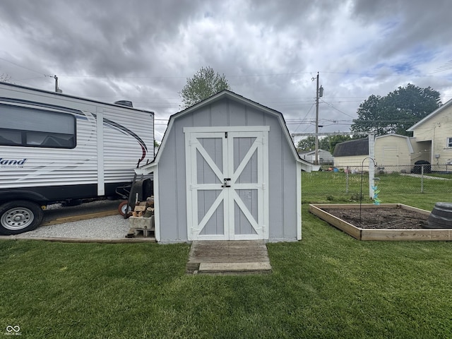 view of shed with a vegetable garden