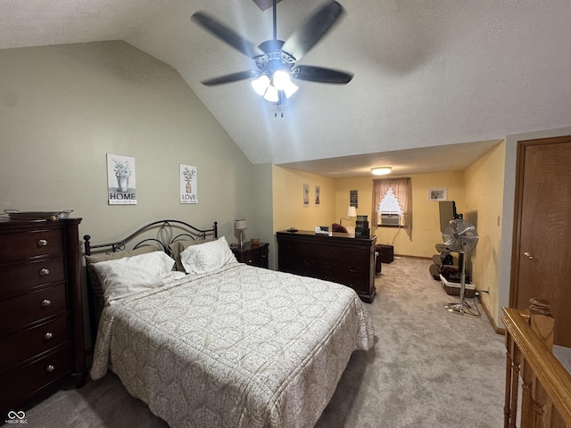 carpeted bedroom with lofted ceiling