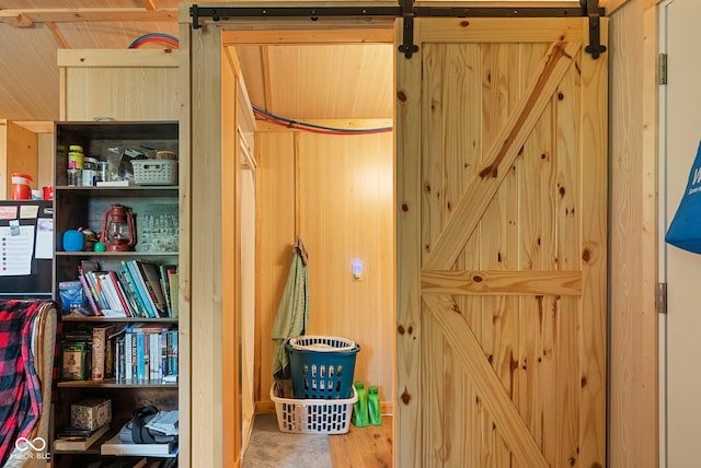 interior details featuring a barn door