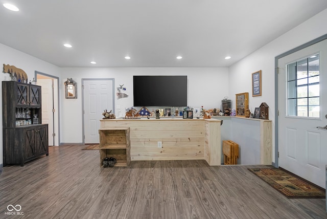 interior space featuring recessed lighting and wood finished floors