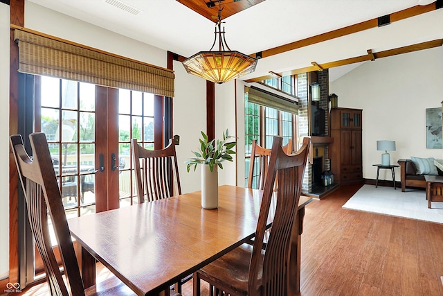 6505 Miramar Ct, Indianapolis, IN 46250 - dining room with french doors, healthy amount of natural light, and wood finished floors