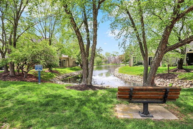6505 Miramar Ct, Indianapolis, IN 46250 - view of home's community with a water view and a yard