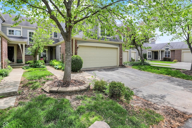 6505 Miramar Ct, Indianapolis, IN 46250 - view of front of house with brick siding and asphalt driveway