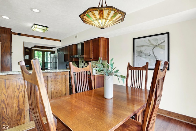 6505 Miramar Ct, Indianapolis, IN 46250 - dining space featuring wood finished floors, baseboards, and recessed lighting