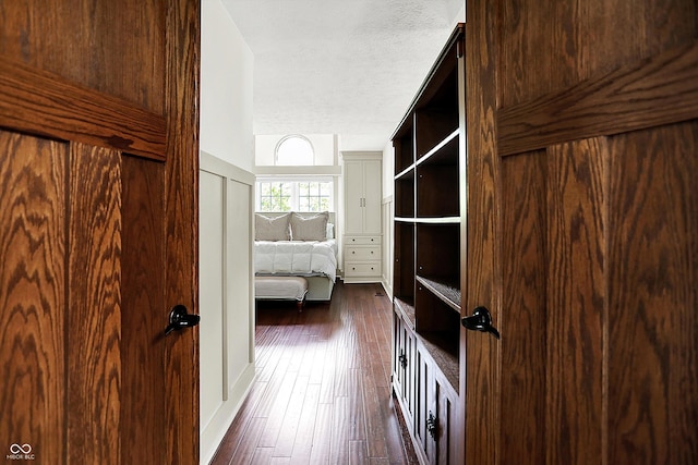 6505 Miramar Ct, Indianapolis, IN 46250 - unfurnished bedroom with dark wood-style flooring and a textured ceiling