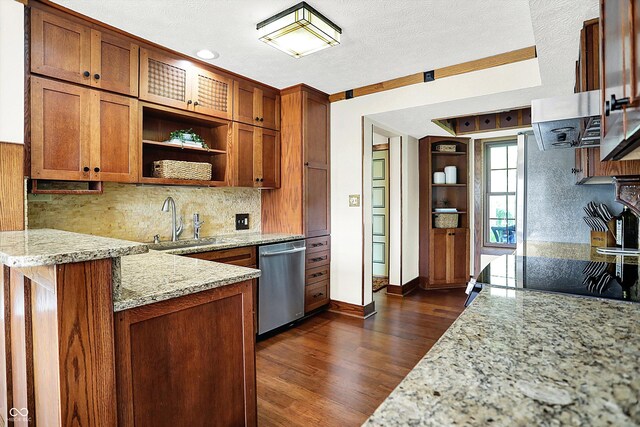 6505 Miramar Ct, Indianapolis, IN 46250 - kitchen with dishwasher, a sink, brown cabinets, backsplash, and light stone countertops