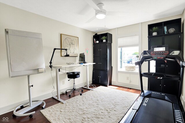 6505 Miramar Ct, Indianapolis, IN 46250 - workout area with wood finished floors and a ceiling fan