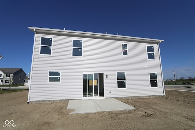 rear view of property with a patio area