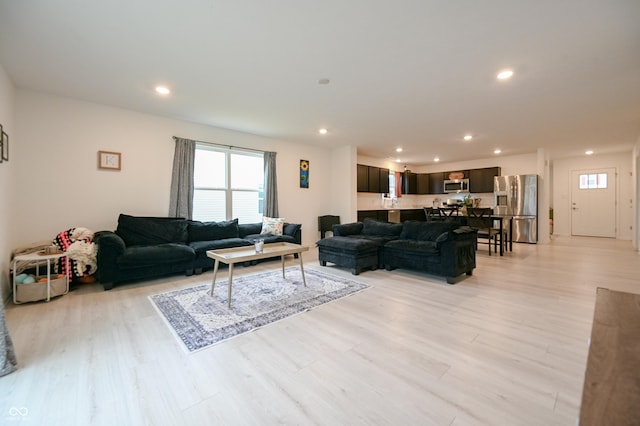 10107 Camp Creek Way, Indianapolis, IN 46229 - living room with light wood-style flooring and recessed lighting