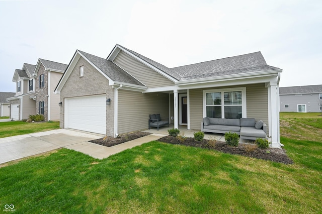 10107 Camp Creek Way, Indianapolis, IN 46229 - view of front of house featuring an attached garage, driveway, a front yard, and an outdoor living space