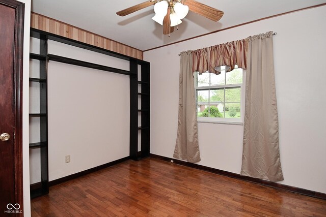 7228 Kimberly Ln, Plainfield, IN 46168 - spare room featuring wood finished floors, baseboards, and ceiling fan