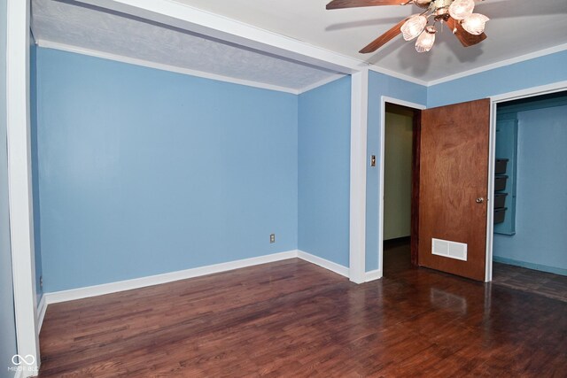7228 Kimberly Ln, Plainfield, IN 46168 - unfurnished bedroom with ornamental molding, wood finished floors, baseboards, and a ceiling fan