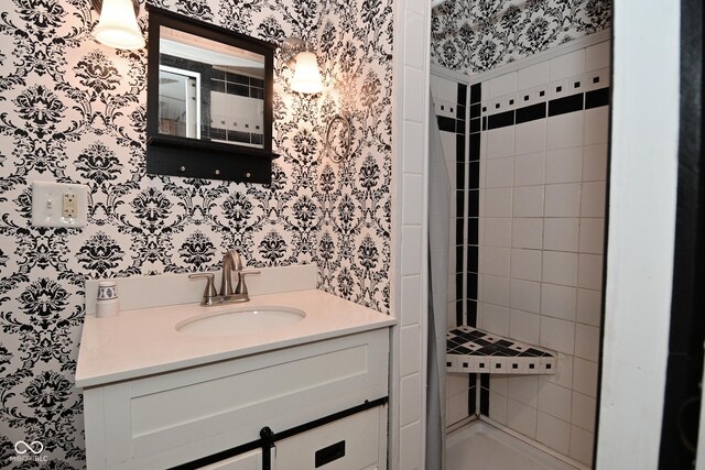 7228 Kimberly Ln, Plainfield, IN 46168 - bathroom with wallpapered walls, vanity, and a shower stall