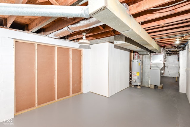 unfinished below grade area with gas water heater and heating unit