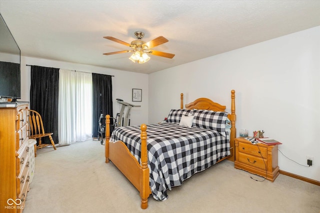 8111 Timberwood Dr, Plainfield, IN 46168 - bedroom featuring light carpet, a ceiling fan, and baseboards