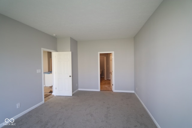 10544 Maidenhair Dr, Indianapolis, IN 46239 - unfurnished bedroom with carpet flooring and baseboards