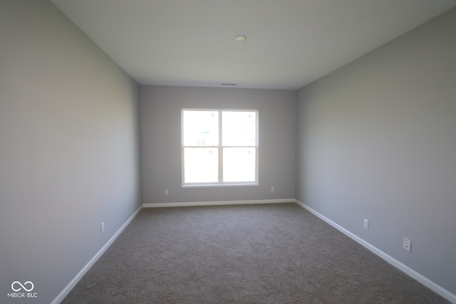 10544 Maidenhair Dr, Indianapolis, IN 46239 - unfurnished room featuring carpet flooring and baseboards