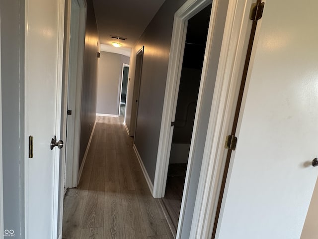 2725 Falcon Ct, Seymour, IN 47274 - corridor featuring wood finished floors and baseboards