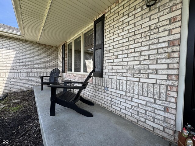 2725 Falcon Ct, Seymour, IN 47274 - view of patio featuring covered porch