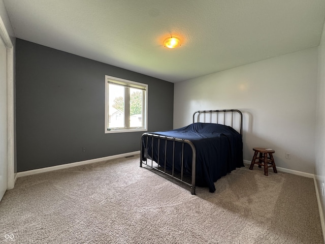 2725 Falcon Ct, Seymour, IN 47274 - carpeted bedroom with baseboards
