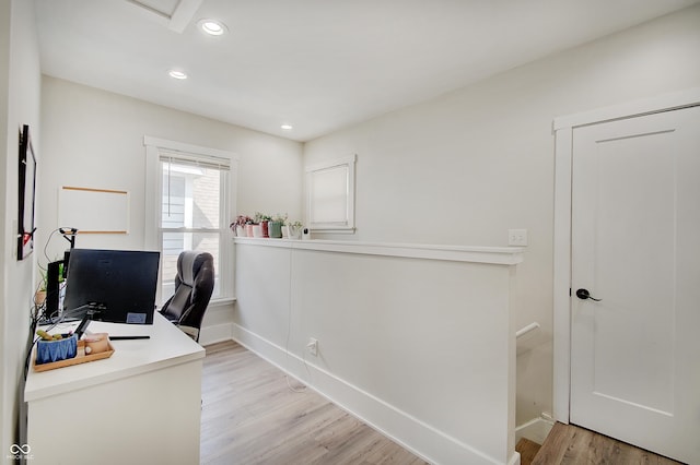 home office with light wood-style flooring, recessed lighting, and baseboards