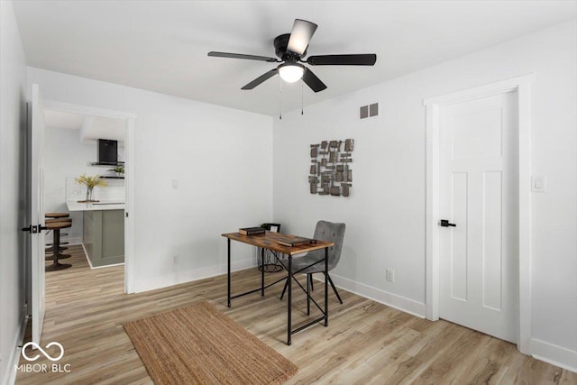 6682 English Dr, Avon, IN 46123 - office space featuring light wood-style floors, a ceiling fan, and baseboards